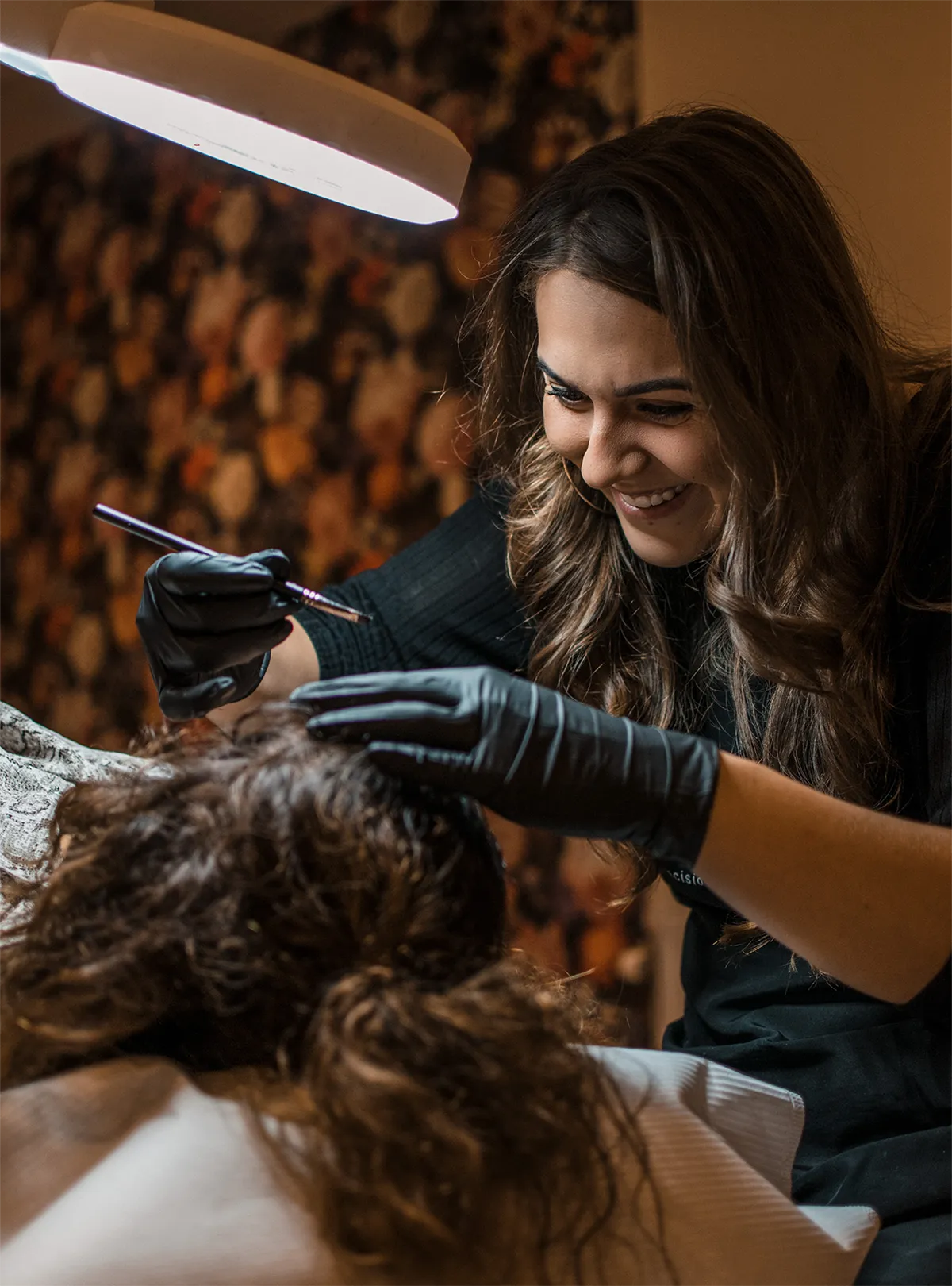 Tineke Colonna performing a semi-permanent brow treatment at Colonna Signature
